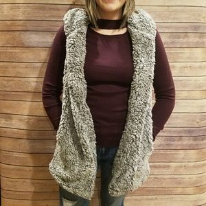 Grey hooded Sherpa vest.